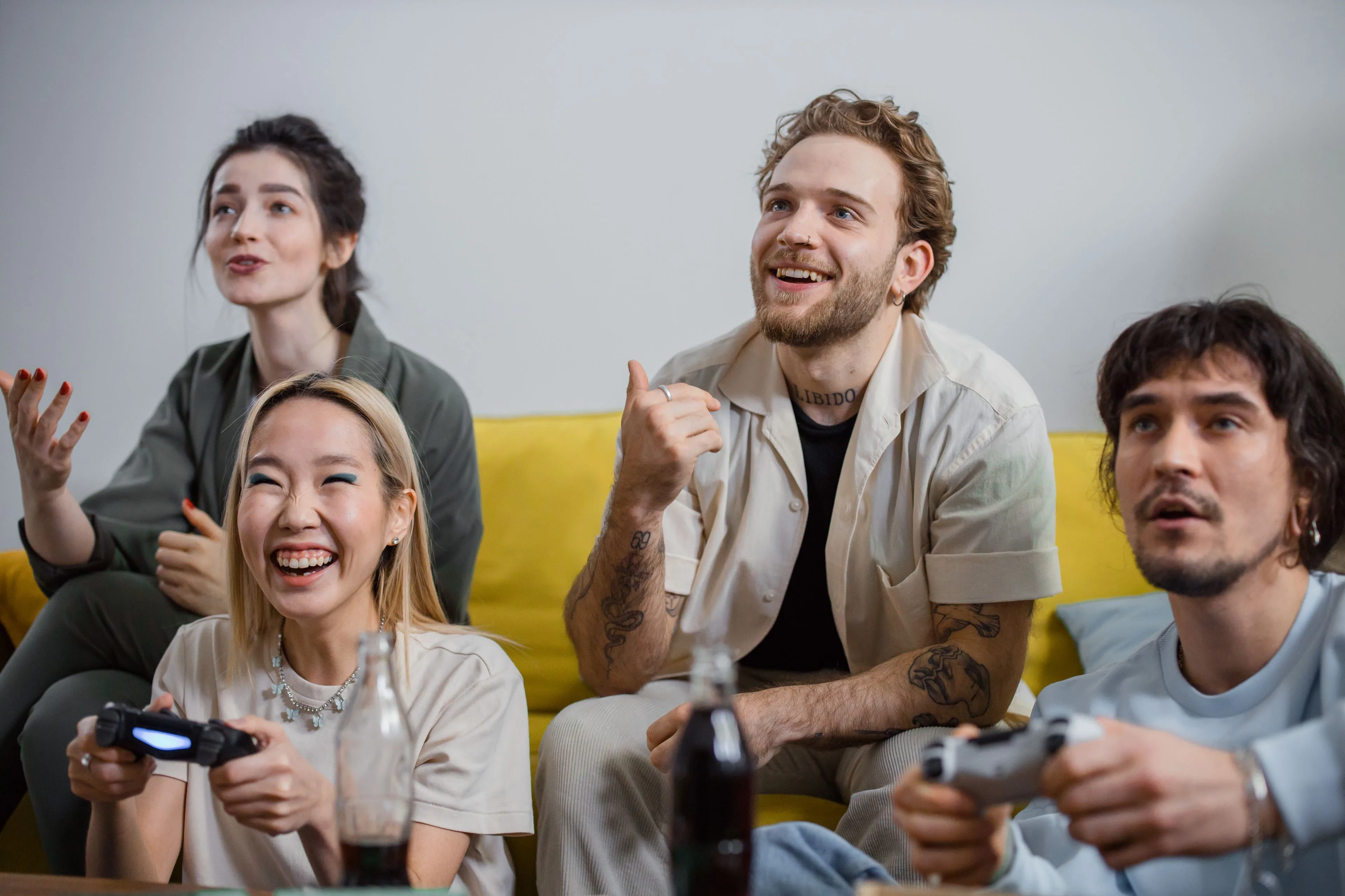 Friends laughing together at a CityCrew night in Calgary